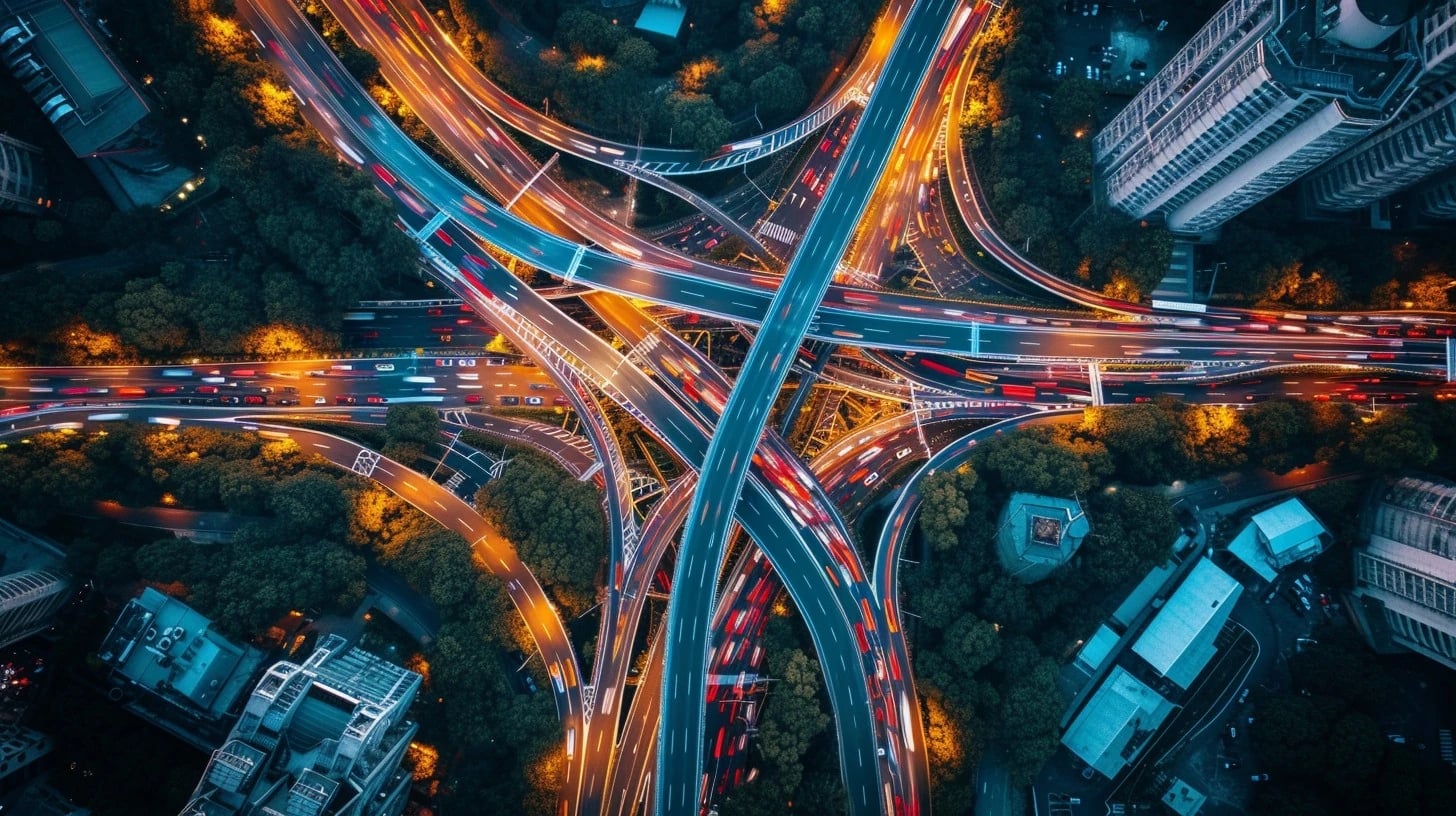 Aerial view of a multi-level highway interchange at night